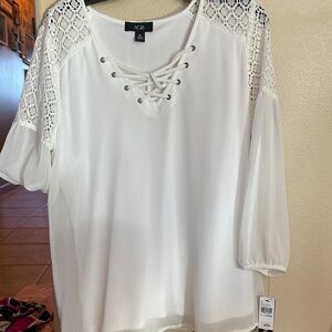 AGB woman’s xlarge. New with tags. Super cute. Beautiful classy or casual.